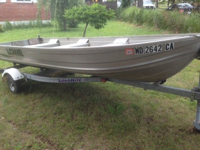 14 ft boat with 15HP motor and trailer - for sale